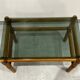Table basse bois blond et verre fumé à ligatures cuir