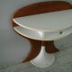 White lasked wood console and 1980s skai background