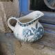 Jug in faience motifs flowers and insects
