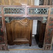 Old façade or decorative frame in carved wood, of Indian origin.