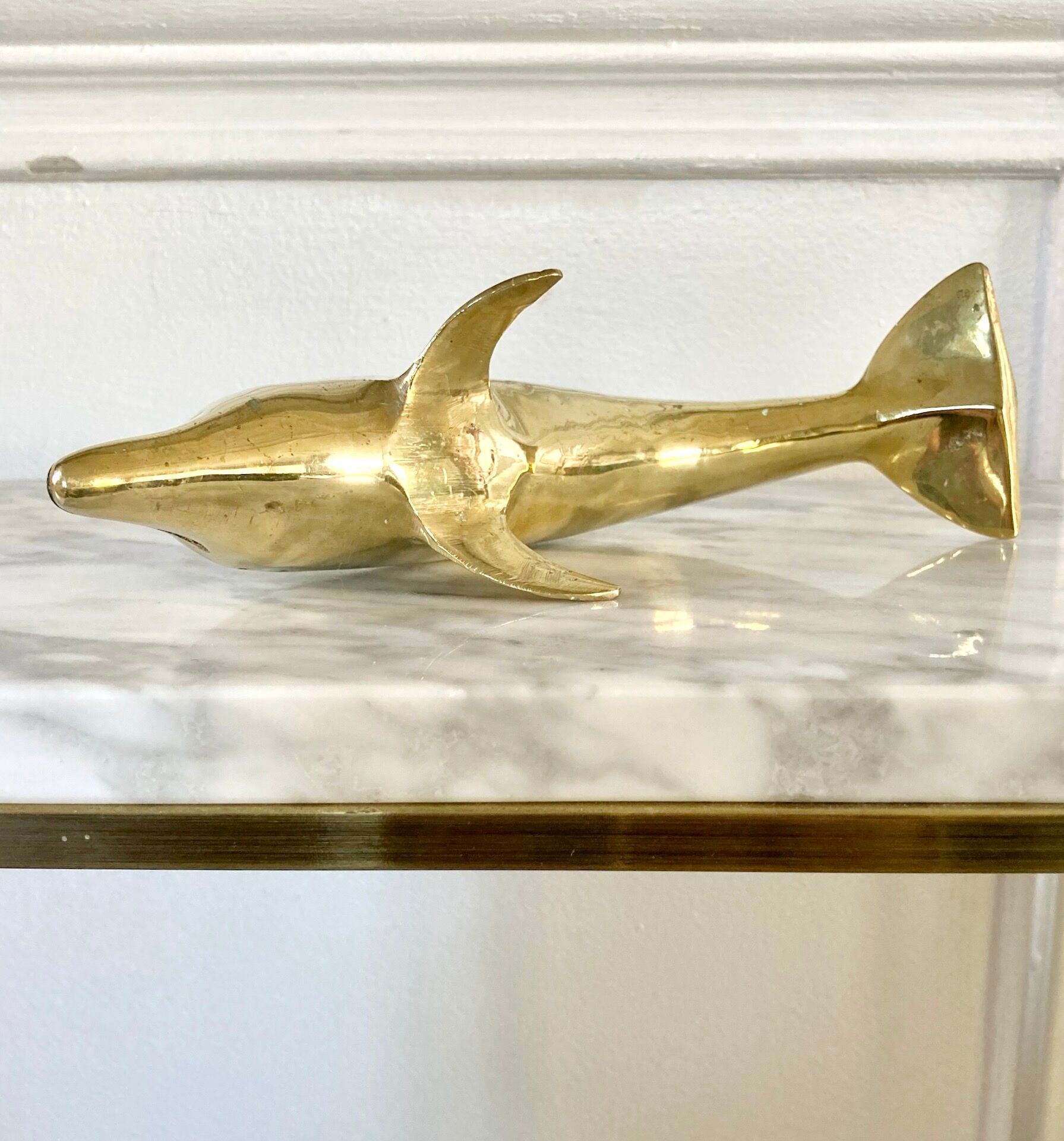 Vintage brass dolphin