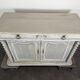 Louis XIII buffet with twisted column in grey patinated oak, two doors, two drawers.