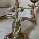 Pair of rocaille candlesticks in gilded bronze