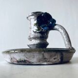 Ceramic candle holder with flower decor