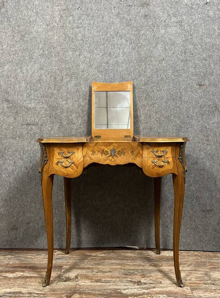 Louis XV style dressing table in "kidney" shape in rosewood decorated with marquetry flowers