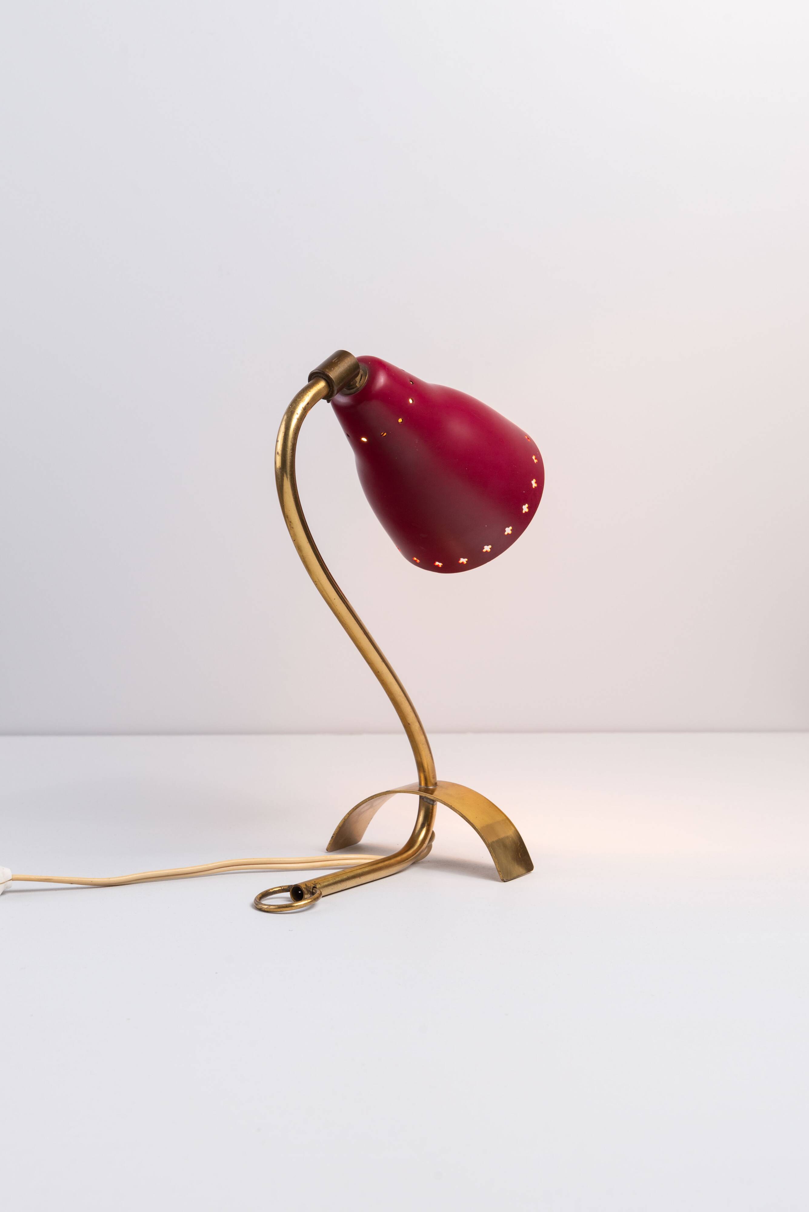 Brass wall lamp with perforated metal shade, 1950s, Sweden