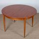 Table de repas ronde et extensible en bois, 1960