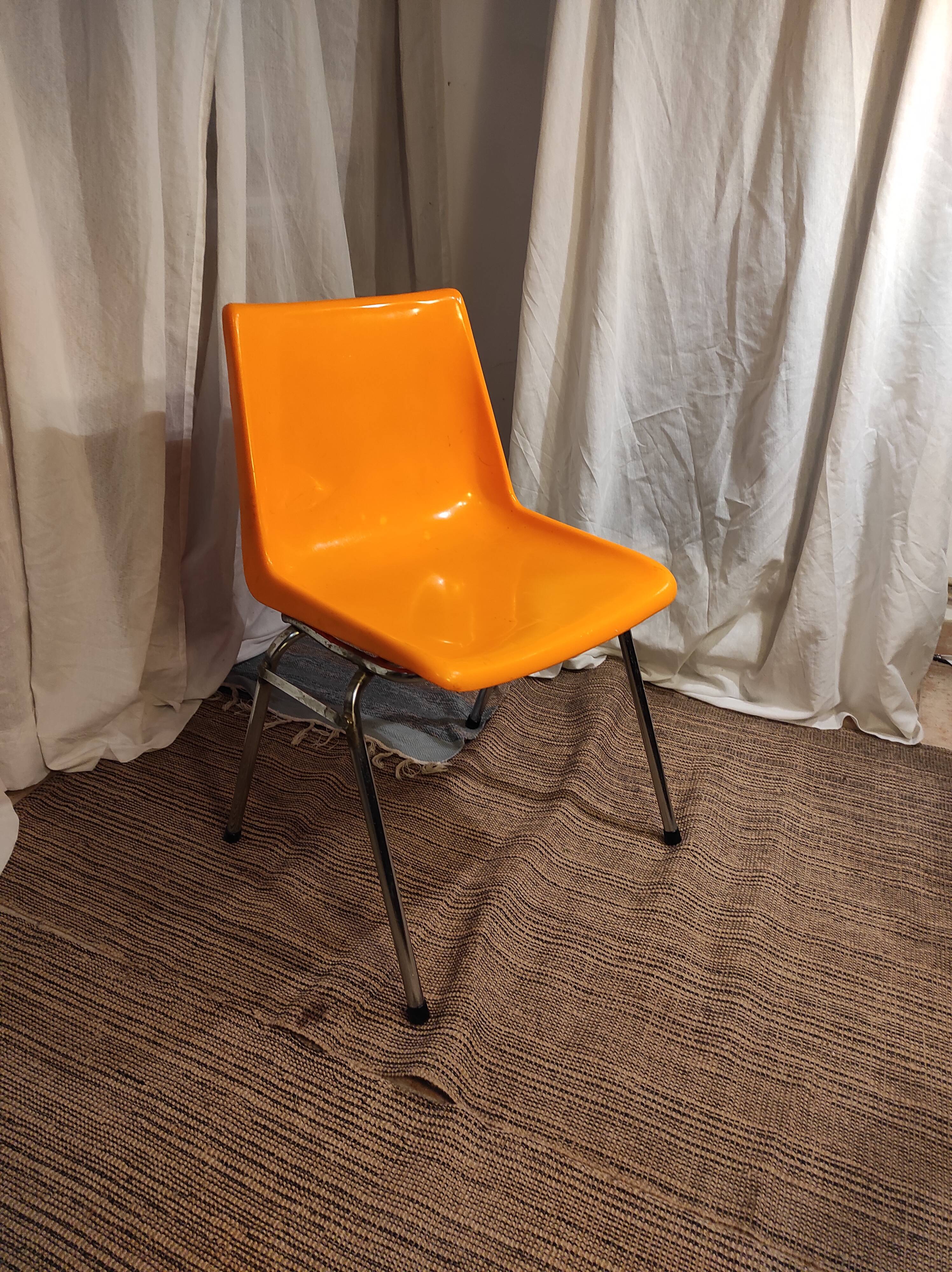 Orange plastic chair 1970