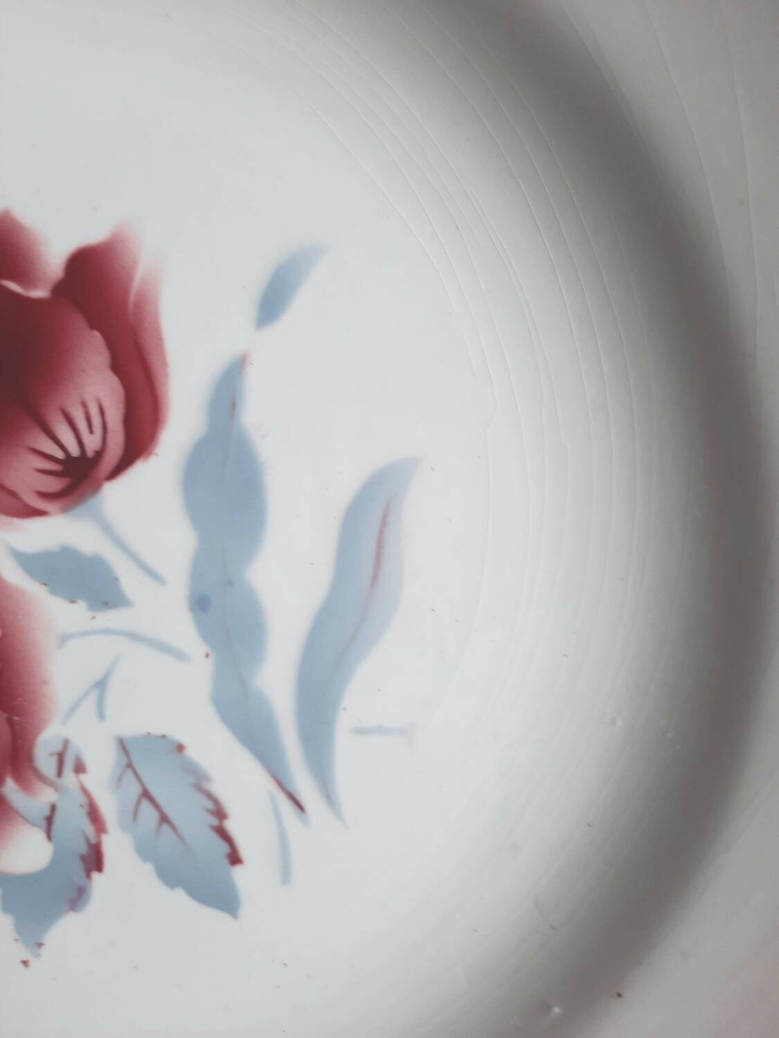 Old mismatched earthenware dinner plates