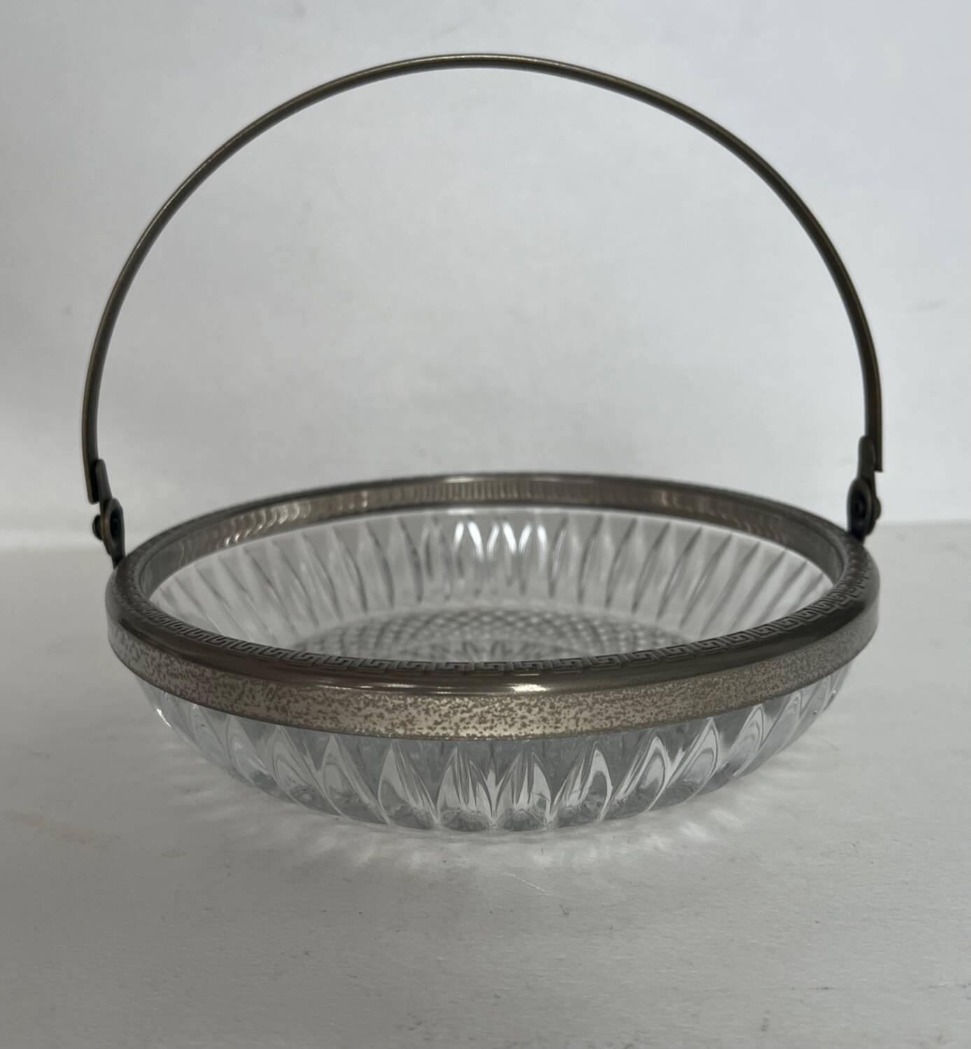Antique glass cup with metal frame