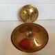 Asymmetrical brass candle holder