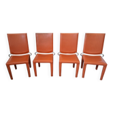 Ensemble de 4 chaises design en cuir orange et fer vintage