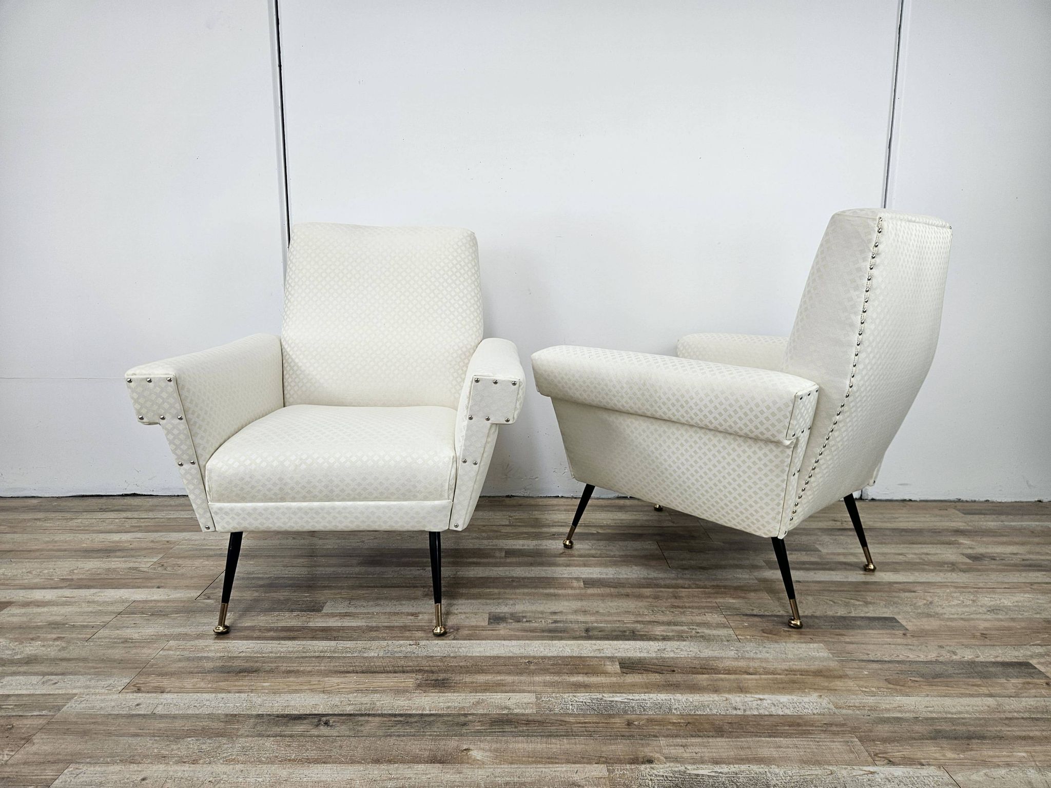 Italian armchairs from the 1950s in cream fabric with iron legs.