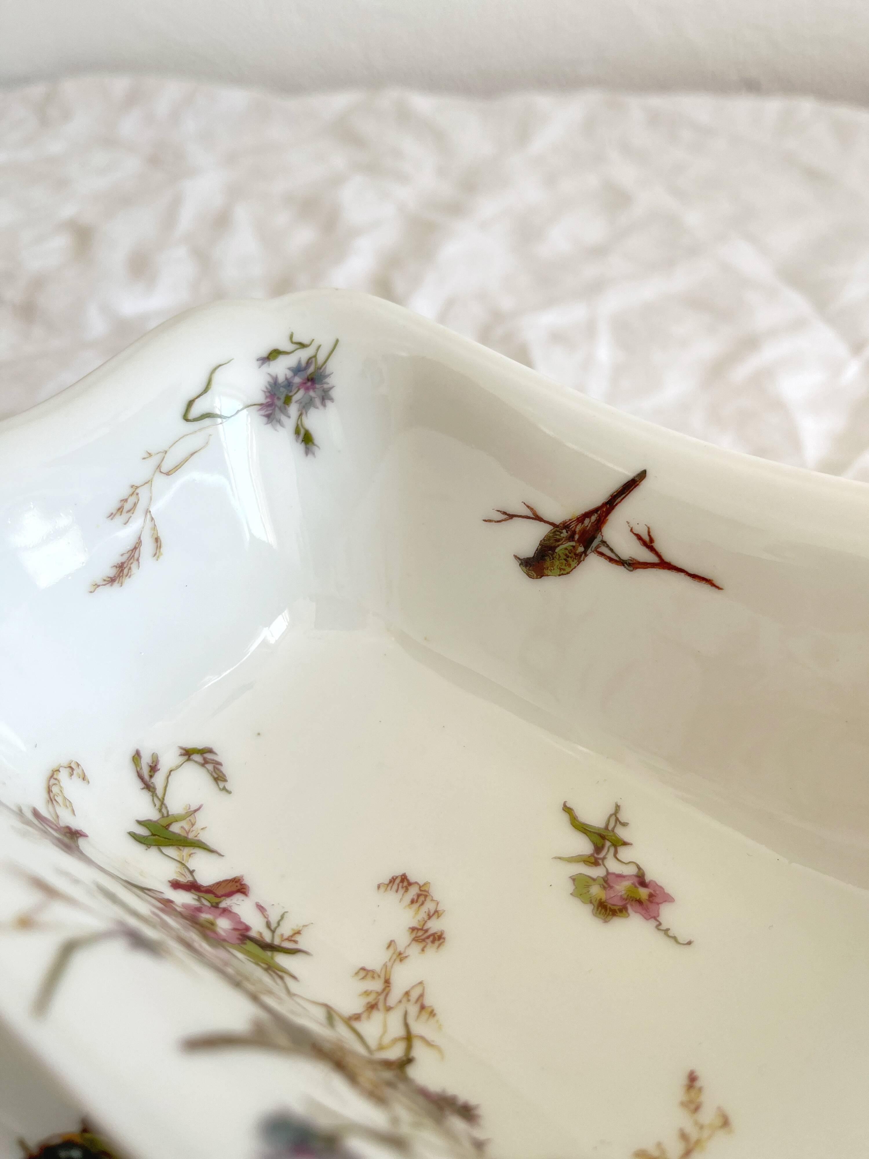 Rectangular sauce boat in Haviland Limoges porcelain with bird decoration