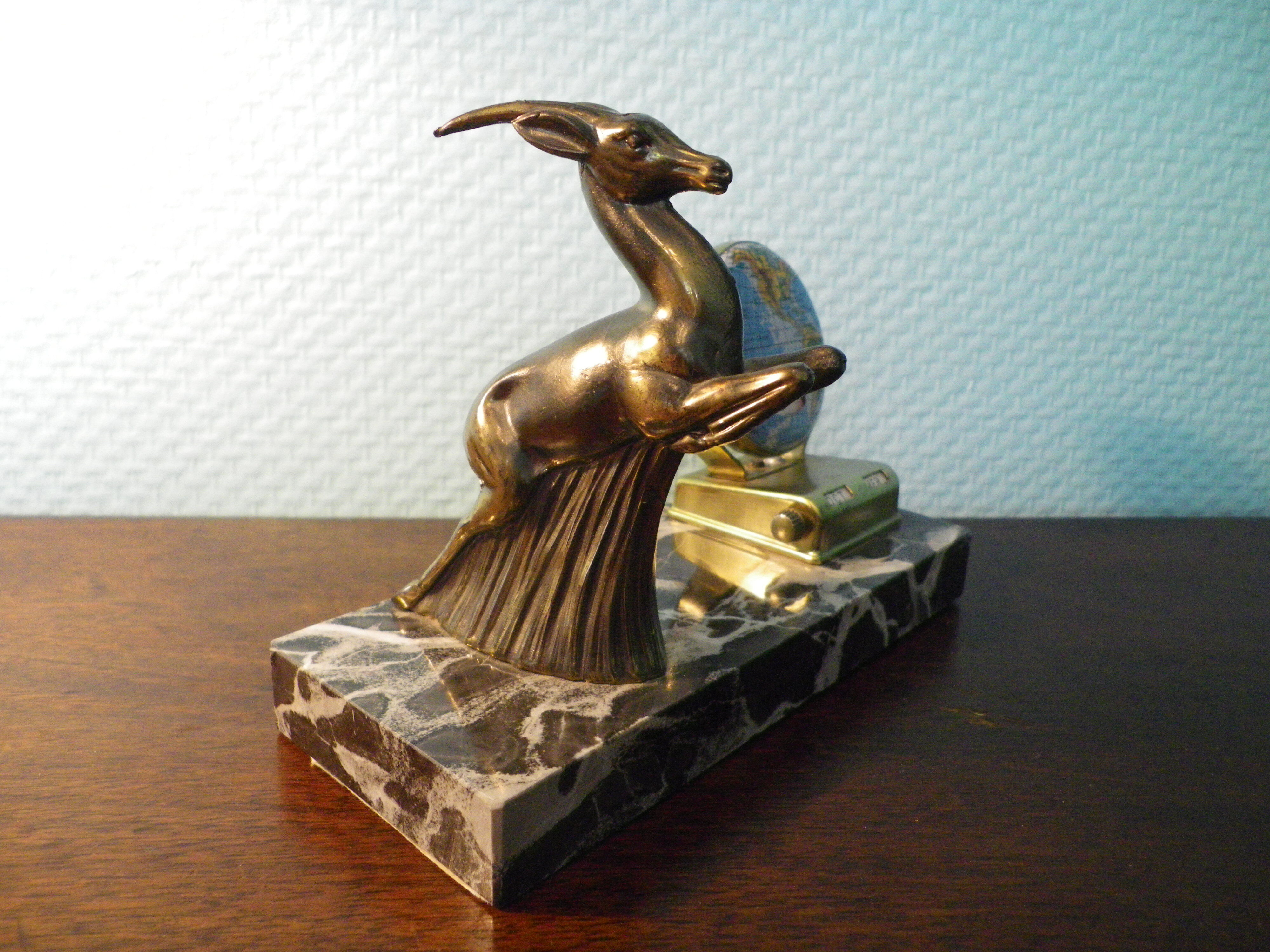 Perpetual calendar on marble base with marble patinated regulated decoration, 60s