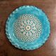 20th century blue enamel plate decorated with lace