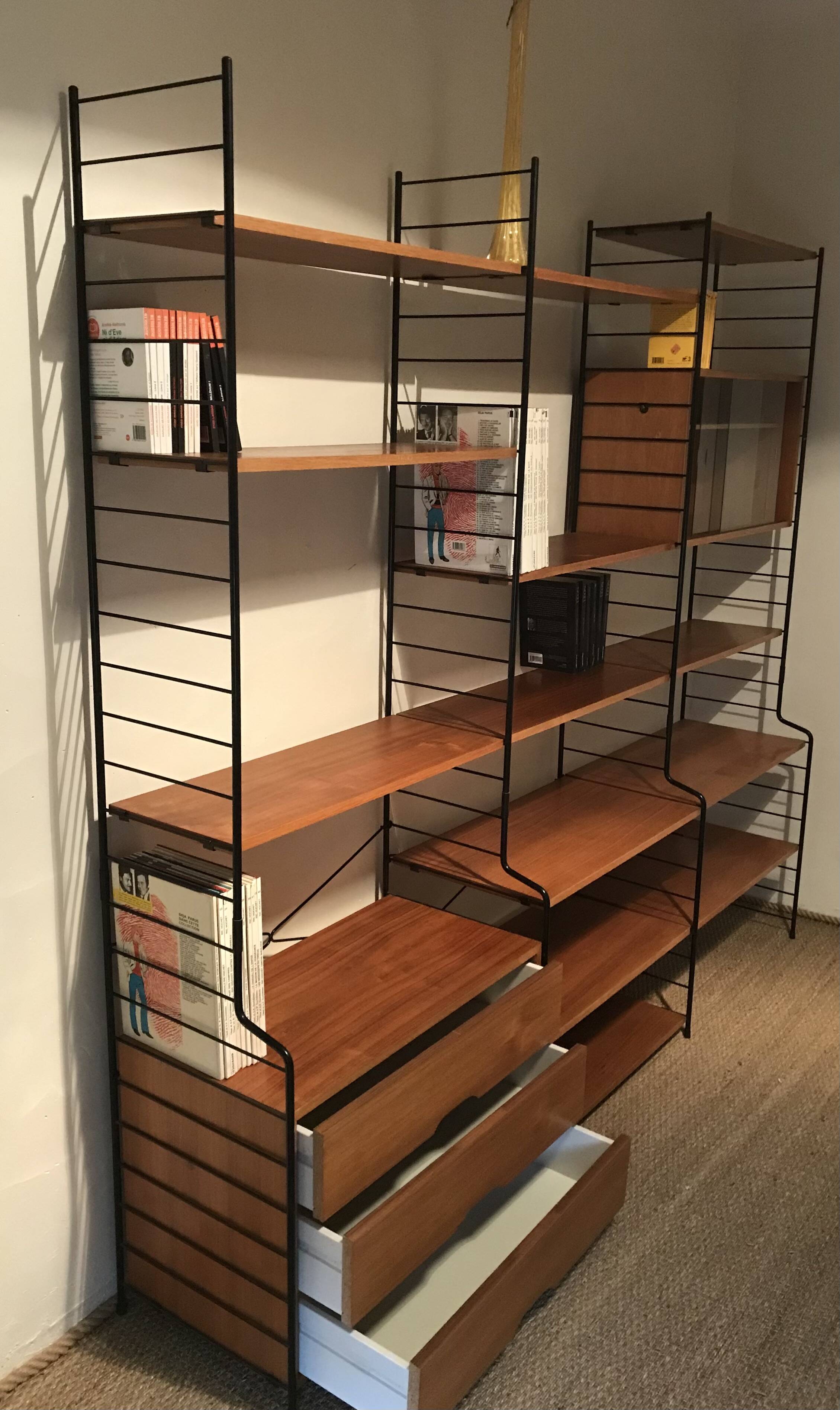 Vintage modular wall-mounted library shelf in blond walnut 1960-80