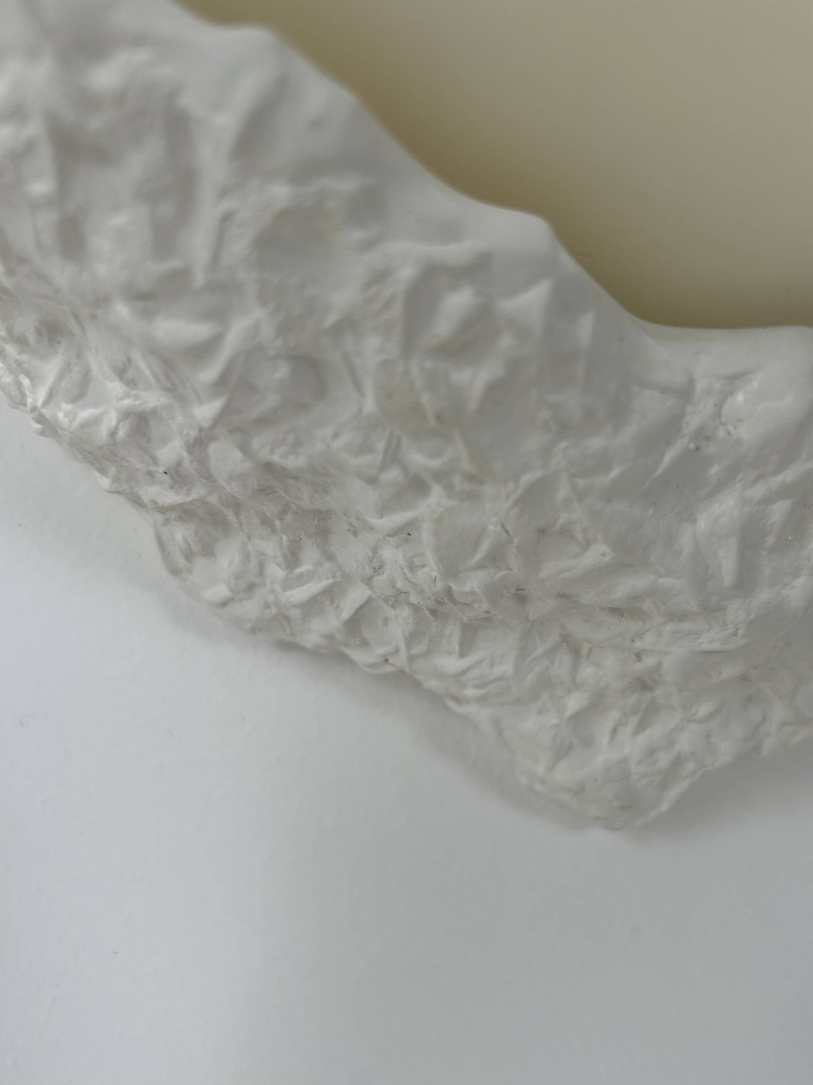 Pair of plaster and frosted glass wall lights, France, 1970.