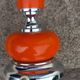 Designer lamp from the 70s in chrome metal and orange lacquered wood