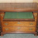 George III commode circa 1770 in walnut by Thomas Chippendale.