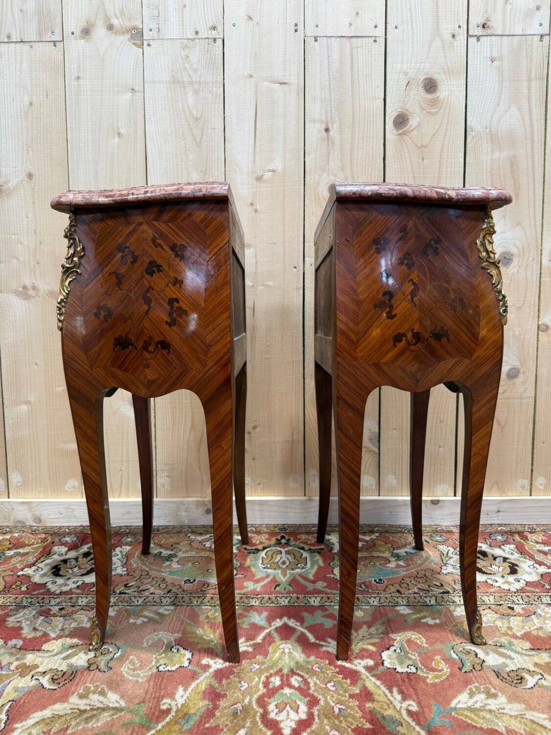 Pair of bedside tables with rosewood marquetry, Louis XV style.