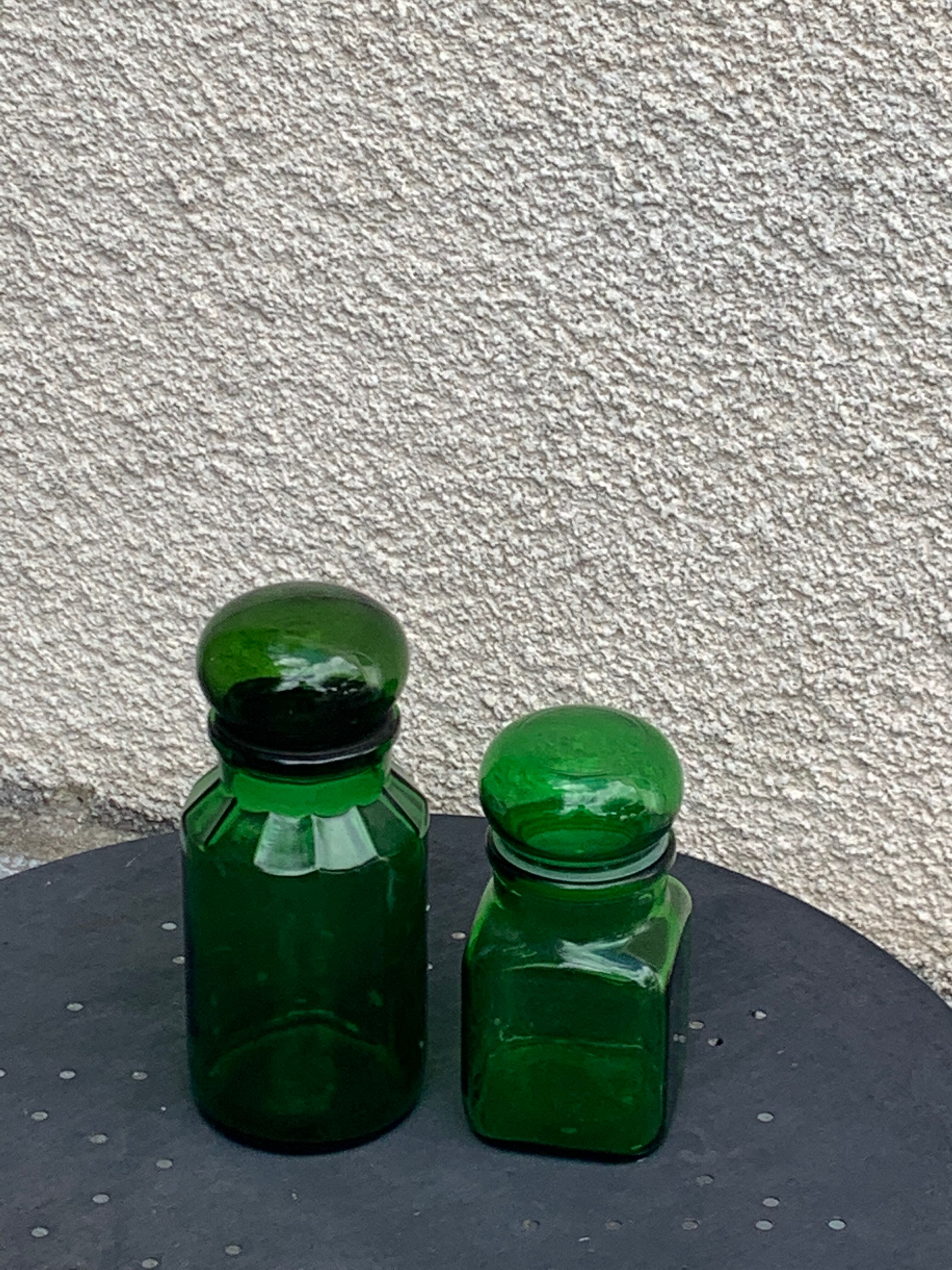 Two jars in green glass advertising vintage 1970