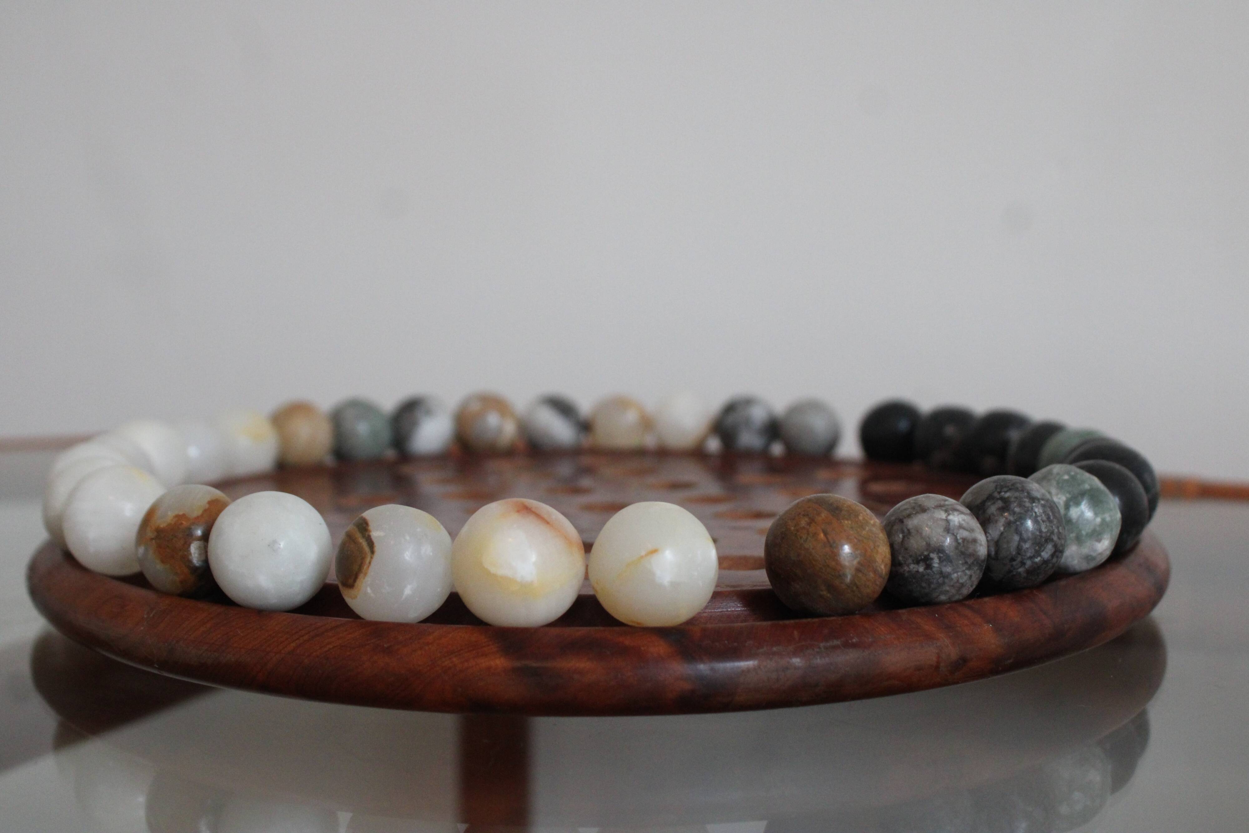 Solitaire game or mineral abacus