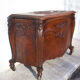 Old chest, carved wooden chest, curved chest on wheels, interior decoration