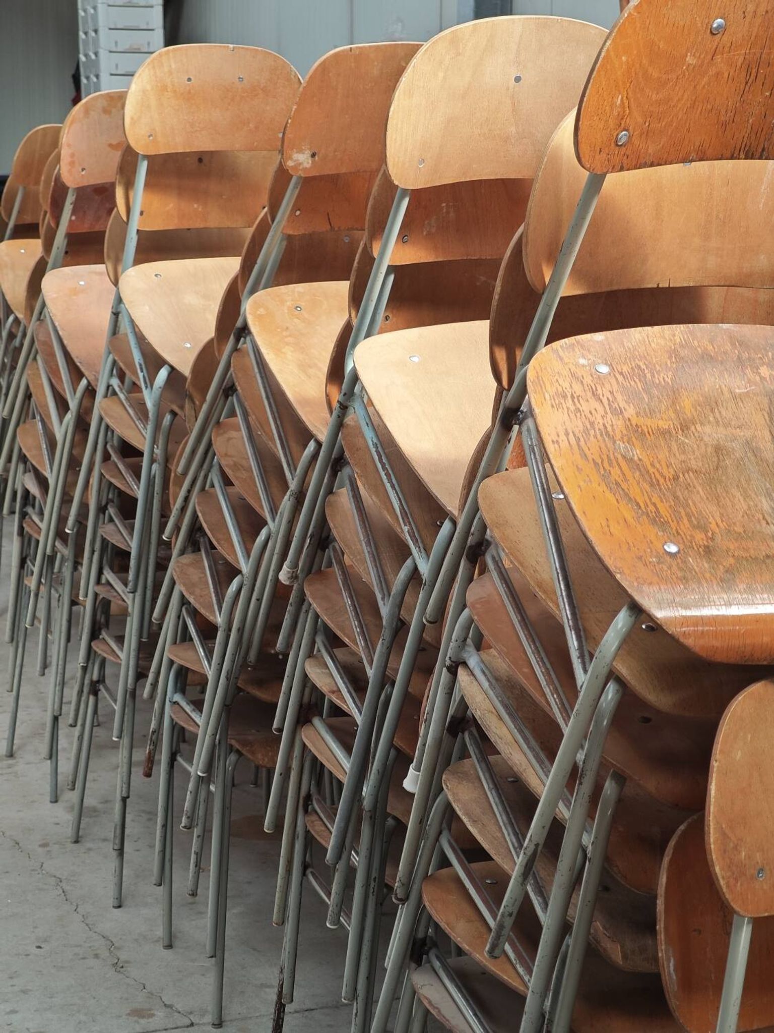 Set of 8 metal and wood school chairs  
Ex Czechoslovakia 1960