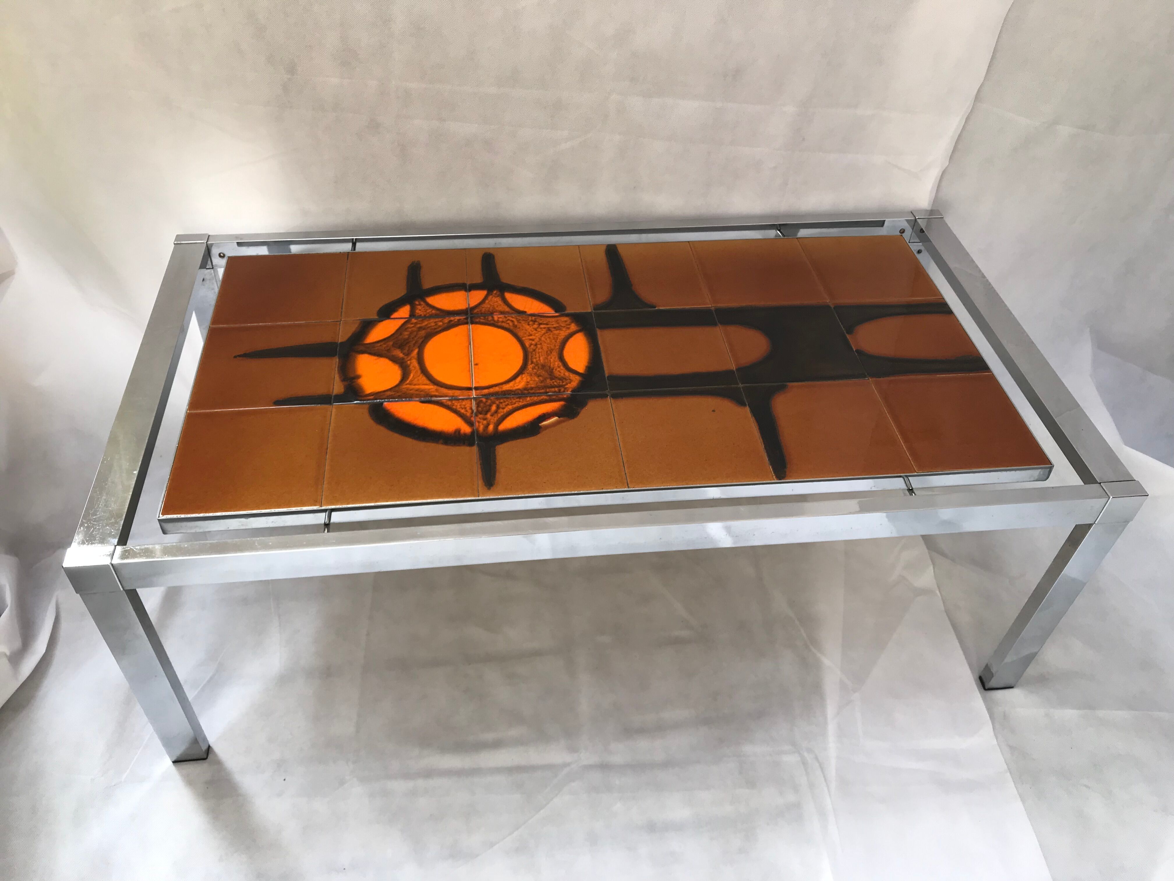 Metal and ceramic earthenware coffee table