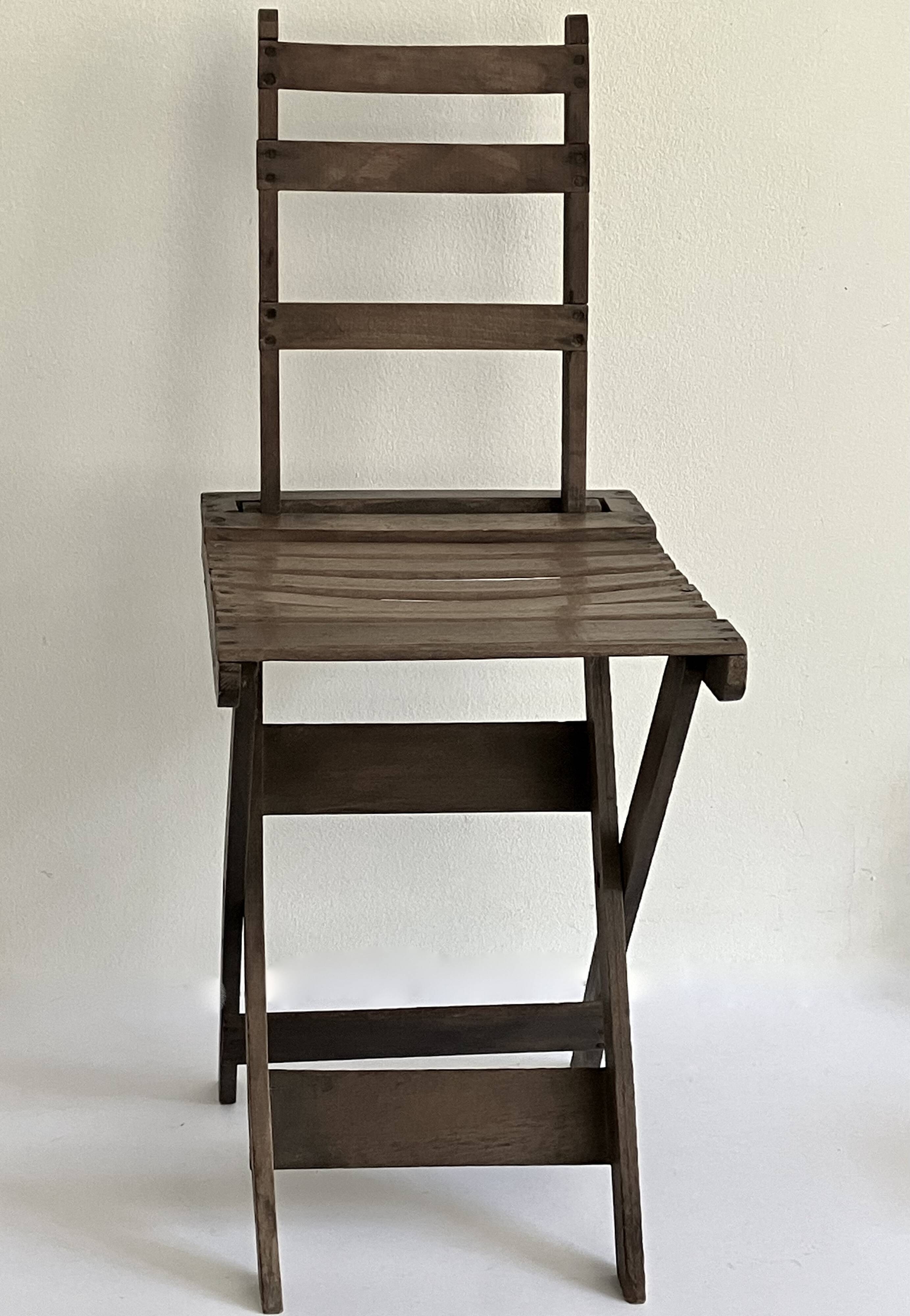 Ancienne chaise pliante avec dossier
