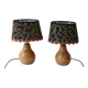 Pair of bedside lamps in pear wood with leopard shade.