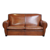 Cognac-colored sheep leather sofa