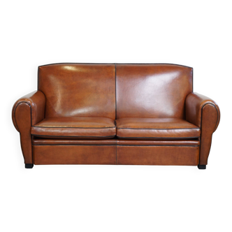Cognac-colored sheep leather sofa
