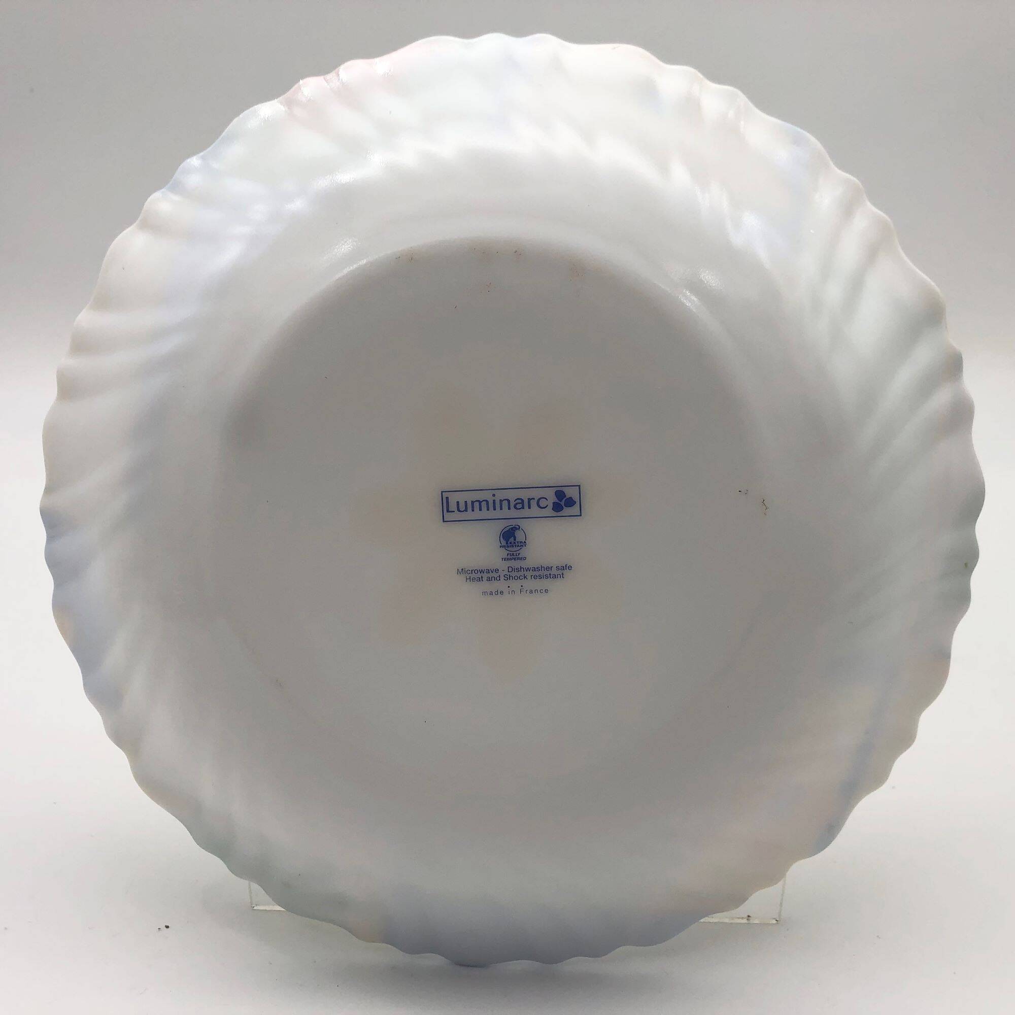 6 hollow plates "luminarc" with flower motifs.