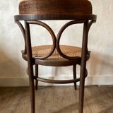 Cane and curved wood armchair