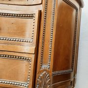 Pair of bow-fronted chests of drawers in walnut