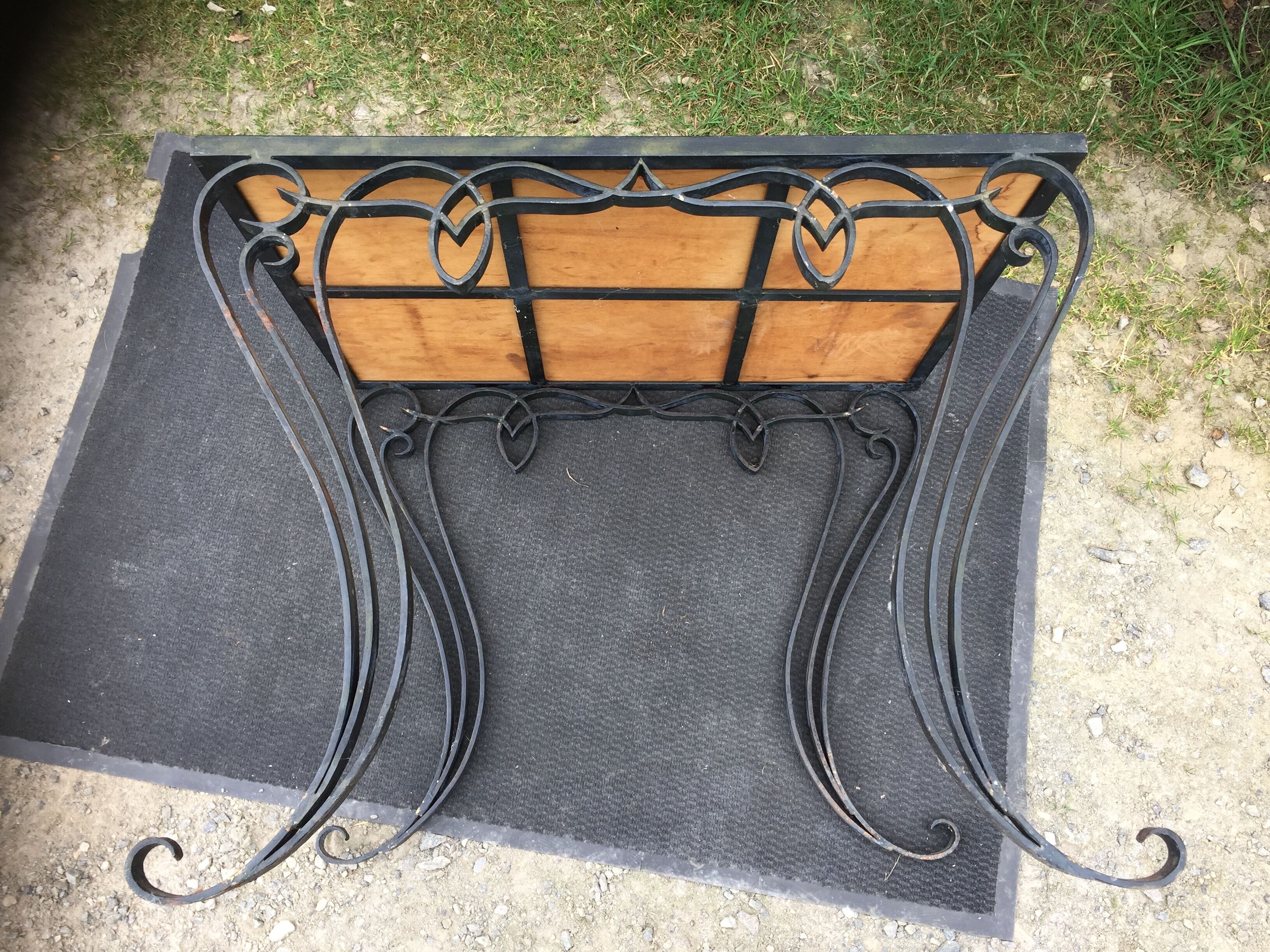 Vintage ceramic coffee table by Guy Trévoux with wrought iron base.