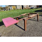 1960s oak dining table with integrated extensions.