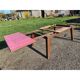 1960s oak dining table with integrated extensions.