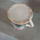Small antique jug in slipware.