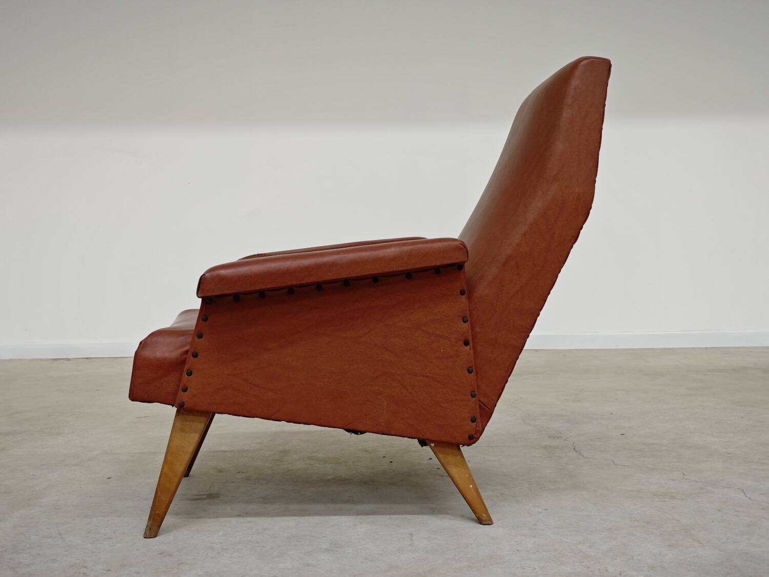 Camel brown imitation leather armchair, France 1960