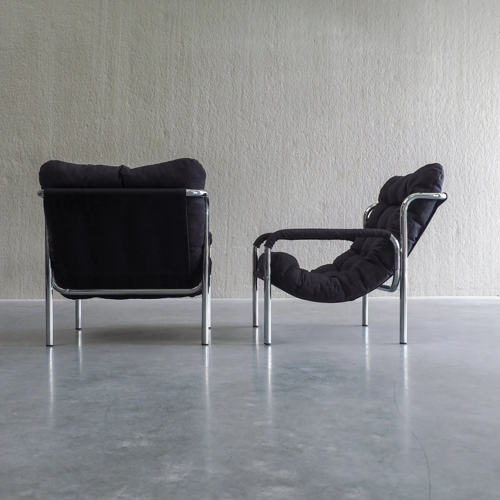 Pair of mid-century modern tubular lounge chairs