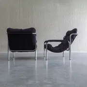 Pair of mid-century modern tubular lounge chairs