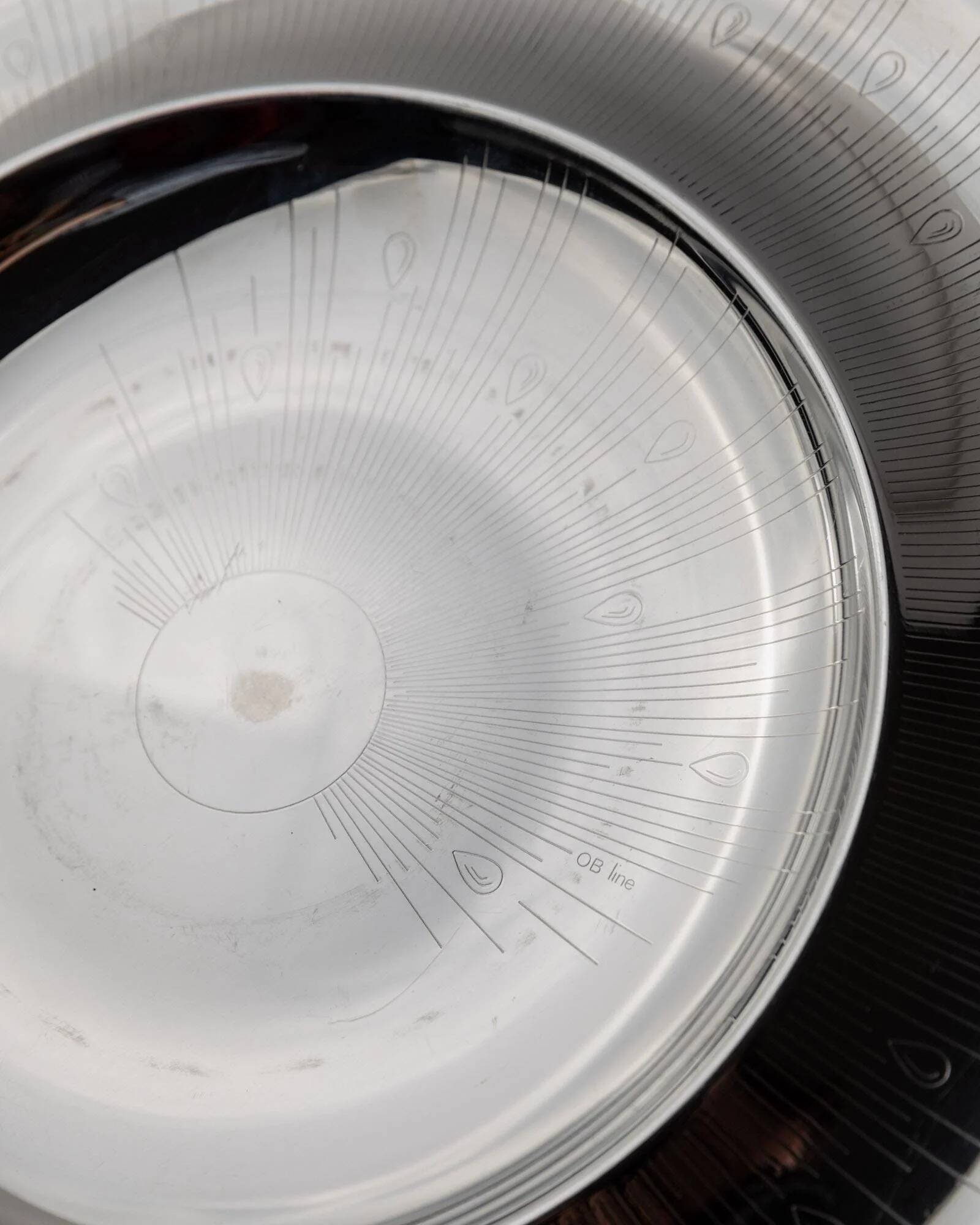 Vintage stainless steel bowl from the 1980s, polished metal with a finely textured surface, timeless elegant design, retro table decoration, noble gift idea.