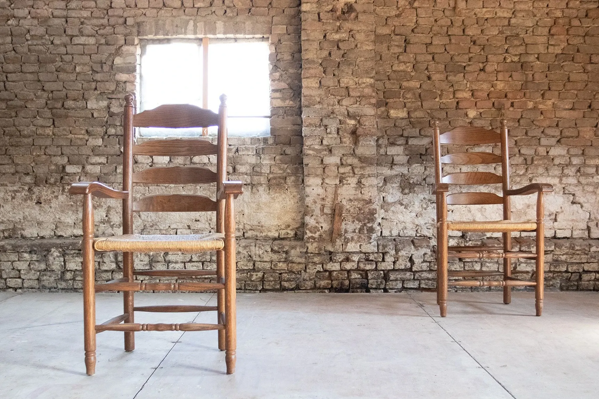 Pair of Dutch oak ladderback armchairs with rush seats – 1960s
