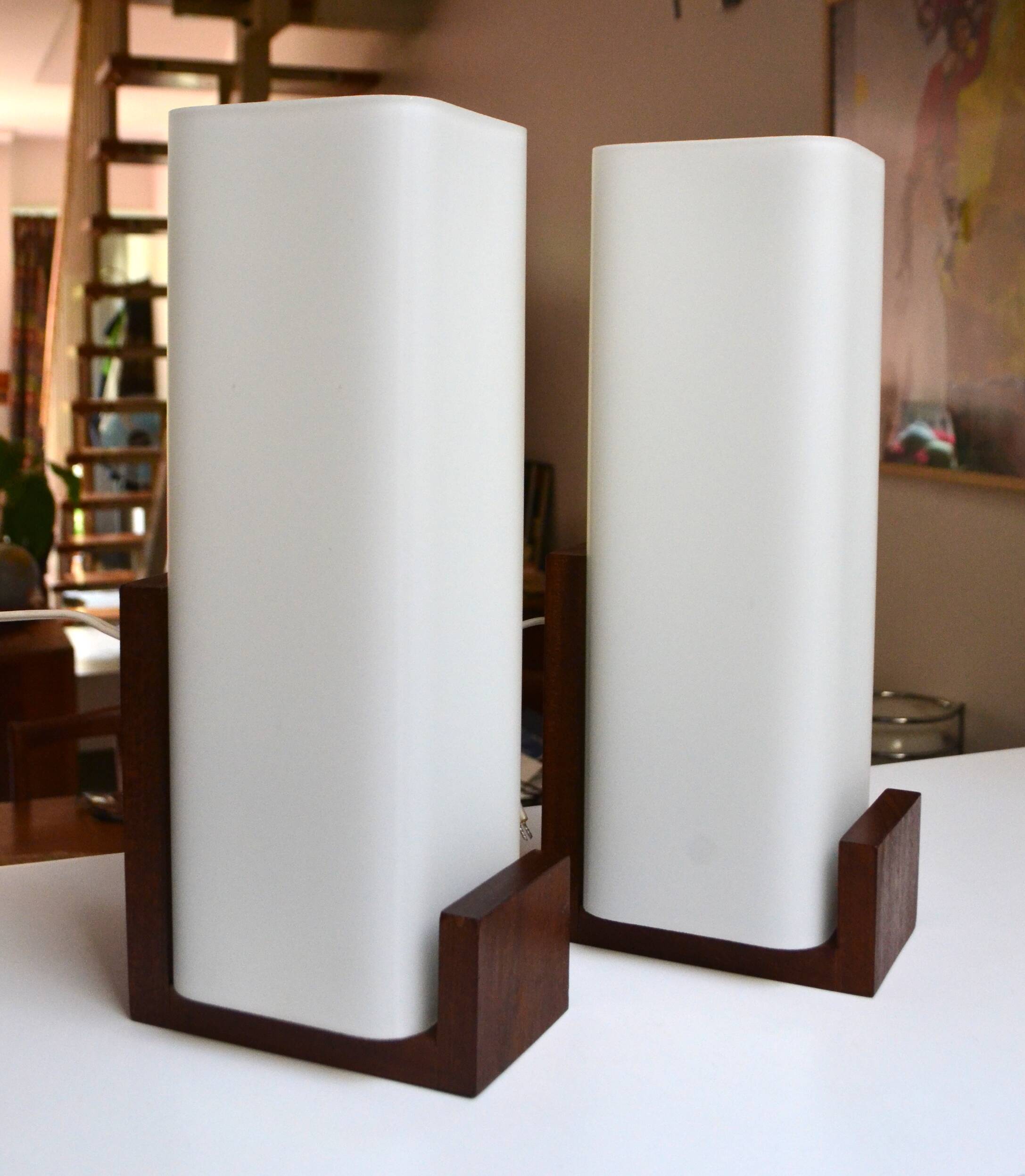 Pair of Louis Kalff wall lights, teak opalines from the 50s/60s.