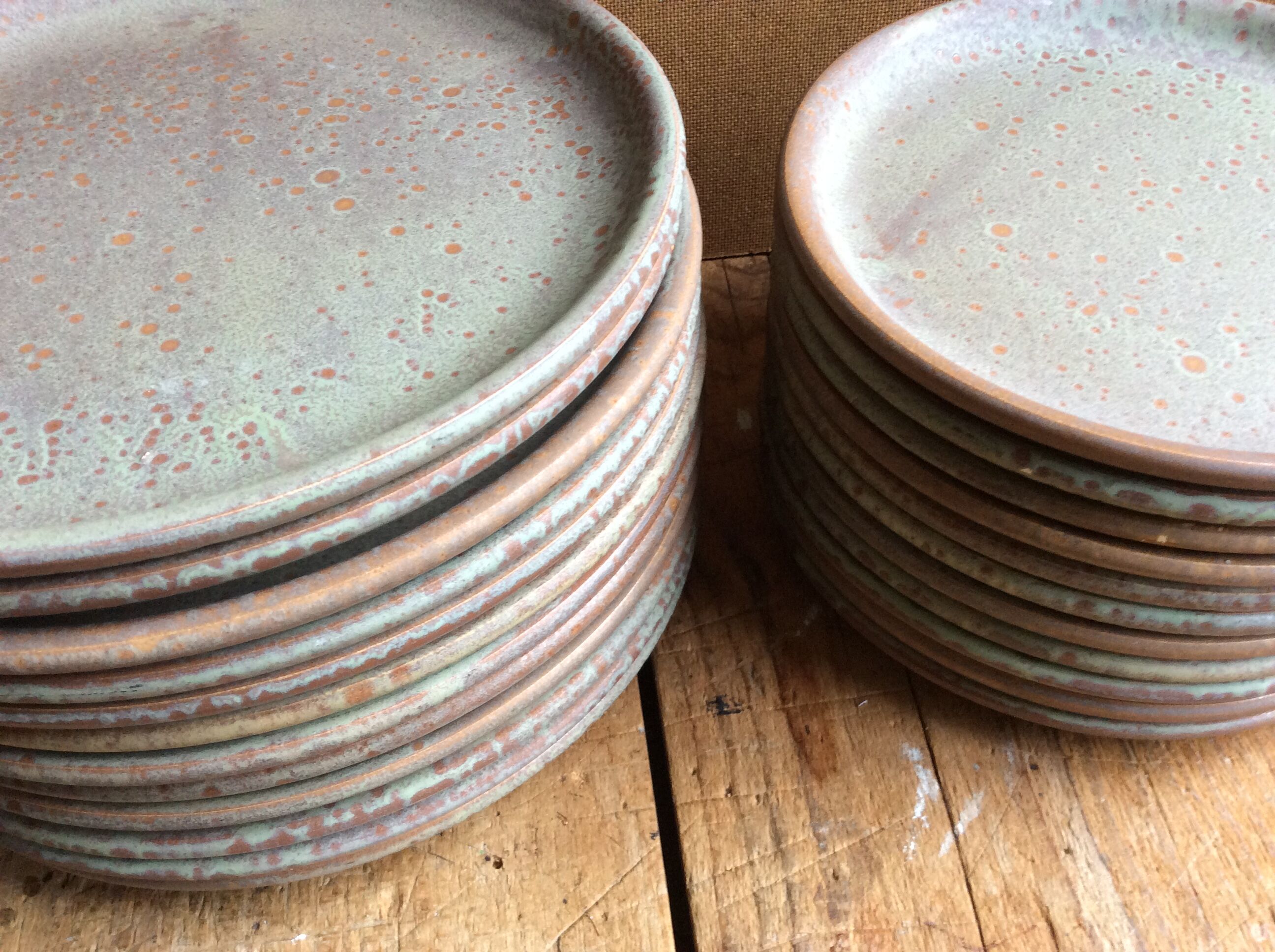 Set of 12 large and 11 small sandstone plates