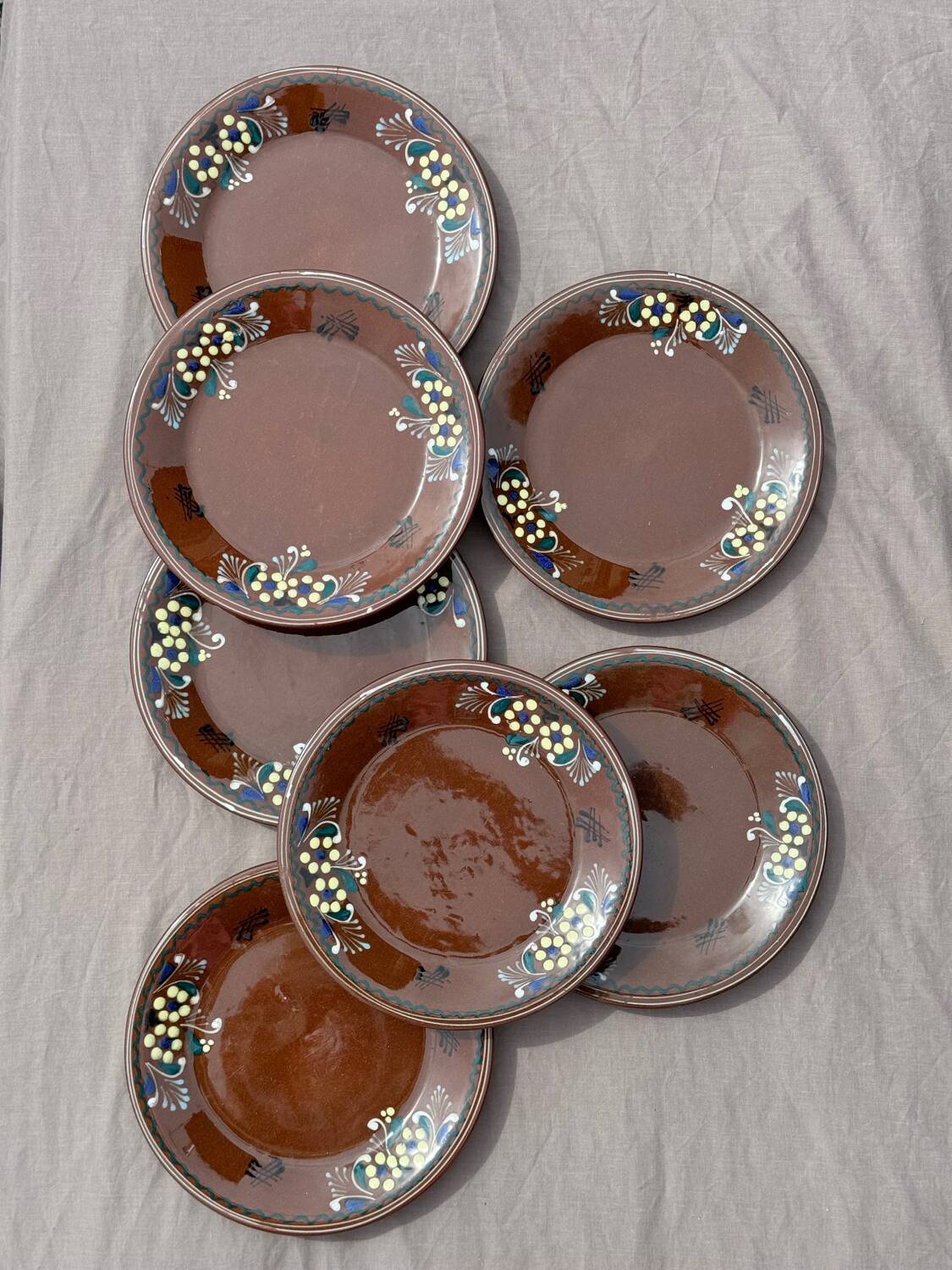 Set of old enamelled terracotta plates