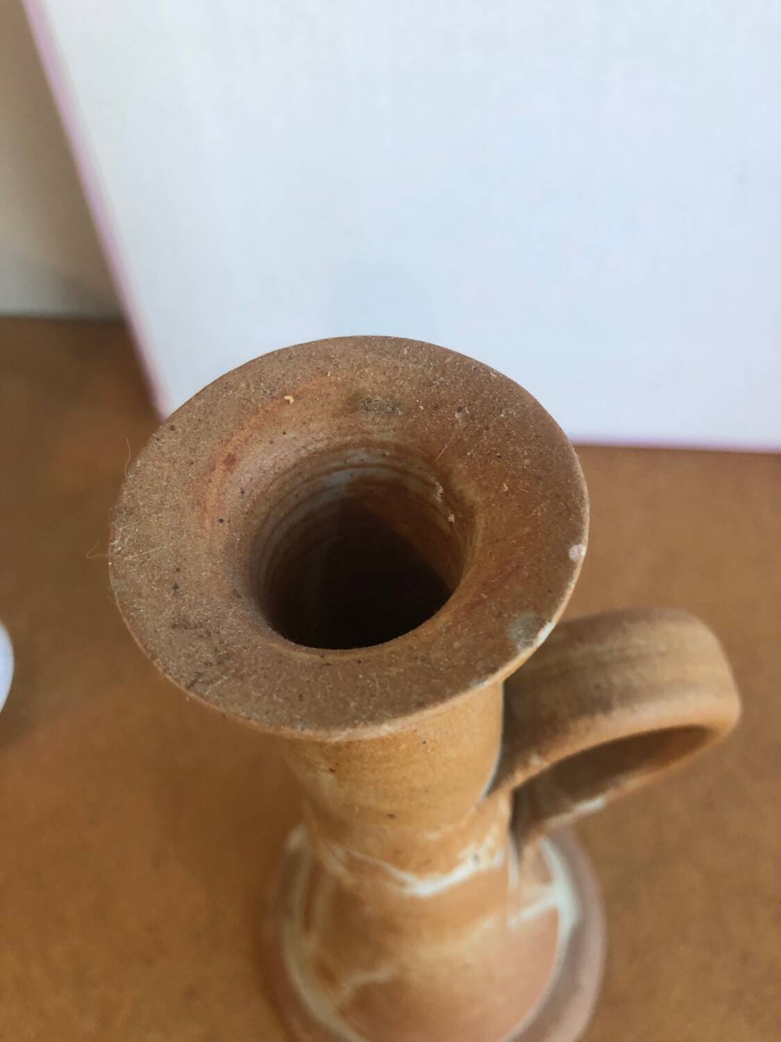 Pretty sandstone candle holder with handle